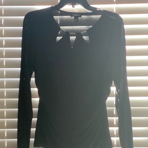 Beautiful blouse for semi formal occasion.